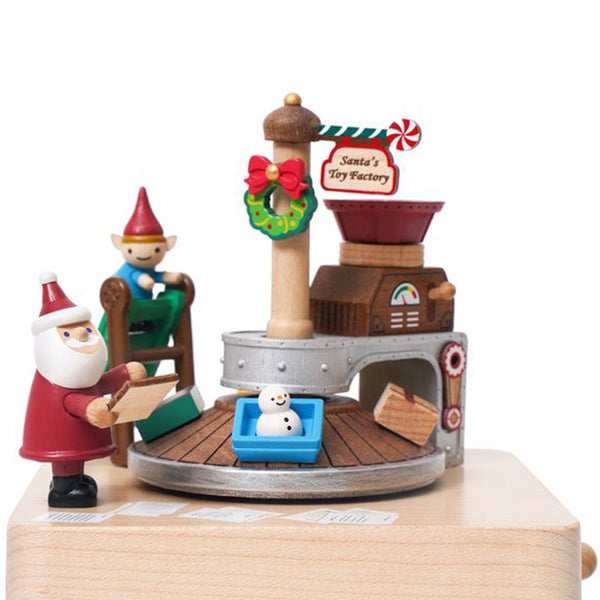 Mechanical festive music box playing O Du Frohliche